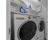 Laundry area with newer white washer and dryer at 2118 Cloud Cover Ln, Raleigh, NC 27614