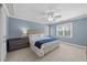 Spacious main bedroom with tray ceilings, fan, and great natural light at 2118 Cloud Cover Ln, Raleigh, NC 27614
