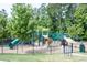 Community playground with slides and climbing structures at 2118 Cloud Cover Ln, Raleigh, NC 27614