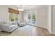 Bright sitting room with access to private outdoor deck at 2118 Cloud Cover Ln, Raleigh, NC 27614