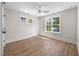 Bedroom with hardwood floors and natural light at 2218 Woodrow St, Durham, NC 27705