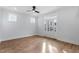 Bright bedroom with hardwood floors and plenty of natural light at 2218 Woodrow St, Durham, NC 27705