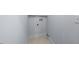 Empty laundry area with tile floors and washer/dryer hookups at 2218 Woodrow St, Durham, NC 27705