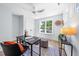 Bright office space with modern decor and a ceiling fan at 2218 Woodrow St, Durham, NC 27705