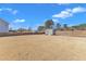 Fenced backyard offering a secure area for outdoor activities with a storage shed and ample space for landscaping at 2220 Stillness Pond Ln, Apex, NC 27539