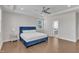 Spacious bedroom with recessed lighting, ceiling fan and modern bathroom at 2220 Stillness Pond Ln, Apex, NC 27539