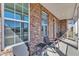 Comfortable front porch with seating, offering a relaxing outdoor space at 2220 Stillness Pond Ln, Apex, NC 27539