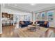 Open floor plan with living room, kitchen and dining room at 2220 Stillness Pond Ln, Apex, NC 27539