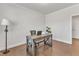 Office space with hardwood floors, crown molding, and natural light at 2220 Stillness Pond Ln, Apex, NC 27539