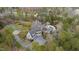 Luxury estate featuring a beautiful home, three-car garage, pool, and meticulously manicured grounds at 266 Perfect Moment Dr, Durham, NC 27713