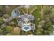 Expansive estate showcasing a stunning home, lush grounds, pool, and mature trees at 266 Perfect Moment Dr, Durham, NC 27713