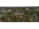 Stunning aerial view of a private estate nestled among lush green trees at 266 Perfect Moment Dr, Durham, NC 27713