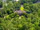 Stunning home with lush landscaping, mature trees, and serene surroundings, offering a private retreat at 266 Perfect Moment Dr, Durham, NC 27713