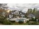 Sprawling backyard with a pool, spa, covered patio, and ample outdoor living space at 266 Perfect Moment Dr, Durham, NC 27713