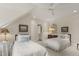 Cozy bedroom offers plush carpeting, matching twin beds, and classic decor at 266 Perfect Moment Dr, Durham, NC 27713