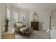Comfortable bedroom features plush carpeting, classic furniture, and ample natural light at 266 Perfect Moment Dr, Durham, NC 27713