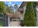 Charming front porch with decorative ironwork and manicured landscaping at 266 Perfect Moment Dr, Durham, NC 27713