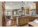 Expansive kitchen with a breakfast nook, fireplace, island, and abundant natural light at 266 Perfect Moment Dr, Durham, NC 27713