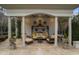 Beautiful covered outdoor lounge featuring comfortable seating and elegant decor at 266 Perfect Moment Dr, Durham, NC 27713