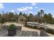 Beautiful pool and cabana surrounded by lush landscaping create a backyard oasis at 266 Perfect Moment Dr, Durham, NC 27713