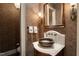Beautiful powder room with designer wallpaper, unique sink and decorative lighting at 266 Perfect Moment Dr, Durham, NC 27713