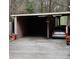 Shot of a carport with a grey car parked on the right side of the frame at 309 Cody St, Durham, NC 27703