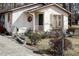 Charming single Gathering house featuring a welcoming front porch and fenced front yard that offers security and curb appeal at 309 Cody St, Durham, NC 27703