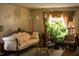 Cozy living room with plants, decorative sofa, and gold accents at 309 Cody St, Durham, NC 27703