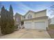 Charming two-story home with a brick accent and a two-car garage at 4 Birkdale Ct, Durham, NC 27713