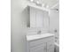 Bathroom featuring a large vanity mirror, a sink, and a combined shower and tub at 419 Eagle Point Rd, Pittsboro, NC 27312