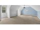 Bonus room offering ample space with natural light from a large window at 419 Eagle Point Rd, Pittsboro, NC 27312