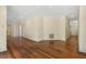 Spacious living room showcasing hardwood floors, neutral walls, and ample space at 419 Eagle Point Rd, Pittsboro, NC 27312
