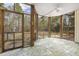 Enclosed patio with view of the backyard, offering an indoor/outdoor living experience at 419 Eagle Point Rd, Pittsboro, NC 27312