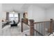 Cozy upstairs loft area featuring a seating area and windows for natural light at 424 Providence Springs Ln, Fuquay Varina, NC 27526