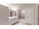 Beautiful bathroom with double sink, walk-in shower, and tile floors at 46 Coffee Tree Cir, Clayton, NC 27527