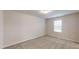 Cozy bedroom with neutral walls, plush carpeting, and natural light at 46 Coffee Tree Cir, Clayton, NC 27527
