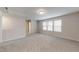 Bonus room boasts plush carpet, neutral walls, and plenty of windows at 46 Coffee Tree Cir, Clayton, NC 27527