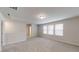 Bright bonus room with neutral walls, plush carpet, and recessed lighting at 46 Coffee Tree Cir, Clayton, NC 27527