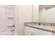 Bathroom with shower-tub combo and a granite-topped vanity with white cabinets at 504 Rhino Bnd, Oxford, NC 27565