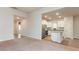 Modern kitchen with stainless steel appliances, white cabinetry, and a granite-topped island at 504 Rhino Bnd, Oxford, NC 27565
