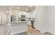 Bright kitchen features granite countertops, stainless steel appliances, and ample white cabinetry at 504 Rhino Bnd, Oxford, NC 27565