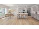 Inviting kitchen with granite countertops, a stylish island, and a dining area at 505 Providence Springs Ln, Fuquay Varina, NC 27526