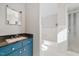 Bathroom featuring a vanity with a dark marble countertop and tiled shower/bathtub combination at 513 W Glendale St, Siler City, NC 27344