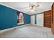Bedroom with a large window, plenty of room, and big closet for ample storage space at 513 W Glendale St, Siler City, NC 27344