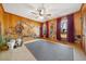 Room with wood paneling, animal-themed murals and multiple windows allowing for ample natural light at 513 W Glendale St, Siler City, NC 27344