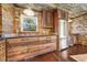 Custom kitchen with wood cabinets, granite countertops, and stainless steel refrigerator at 513 W Glendale St, Siler City, NC 27344