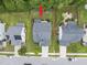 An aerial view of the home featuring a well-manicured lawn and landscaping, nestled in a neighborhood setting at 622 Lone Pine Loop, Fuquay Varina, NC 27526