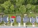 An aerial view of the home showcasing mature trees providing backyard privacy, with a train track close by at 622 Lone Pine Loop, Fuquay Varina, NC 27526