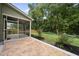 The home features a patio with a screened porch and garden beds at 622 Lone Pine Loop, Fuquay Varina, NC 27526