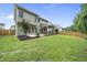 The backyard features a patio with garden beds and a screen porch at 622 Lone Pine Loop, Fuquay Varina, NC 27526